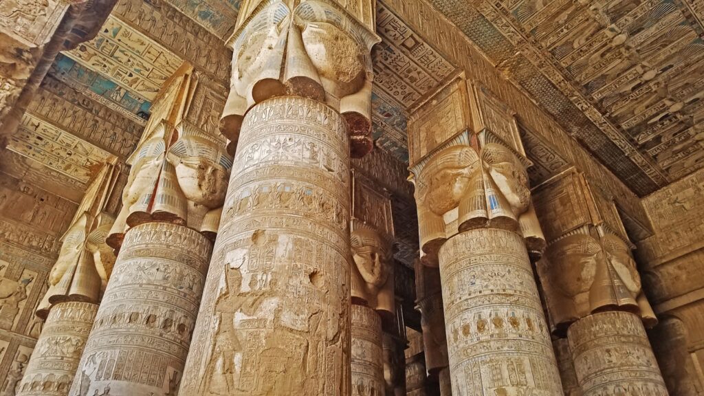 The columns of the temple are decorated with egyptian art
